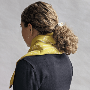 Tranquil 2 lb. weighted cotton wrap for the neck and shoulders side view covering the back of the neck area